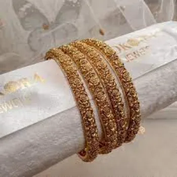Sun Expo Gold Bangles