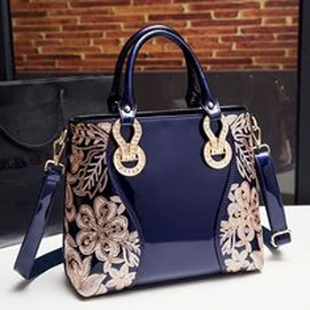 Lavish Party Wear Brinjal Color Designer Bag For Women