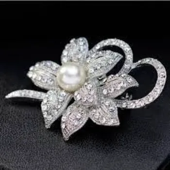 High Standard Silver Brooches