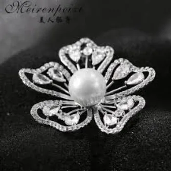 Polished Silver Brooches